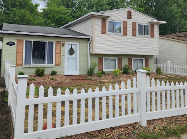 24725 Orchid St, Harrison Twp, MI 48045 - tri-level home with brick siding and a fenced front yard