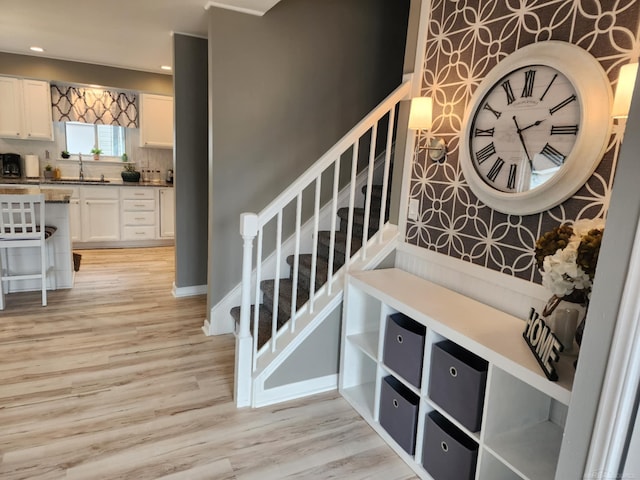 24725 Orchid St, Harrison Twp, MI 48045 - stairway featuring wood finished floors and recessed lighting