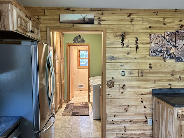 5077 Henry Hwy, Lewiston, MI 49756 - kitchen with freestanding refrigerator and dark countertops