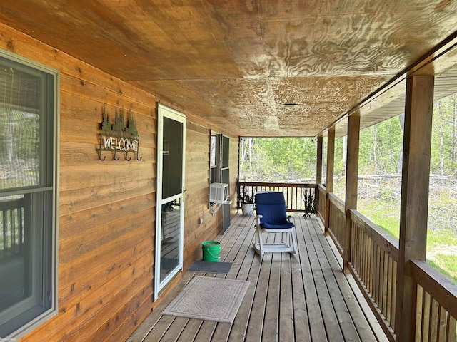5077 Henry Hwy, Lewiston, MI 49756 - wooden porch with cooling unit