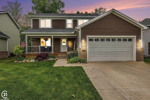 229 Mussey St, Romeo, MI 48065 - traditional-style house with concrete driveway, a porch, brick siding, a lawn, and a garage