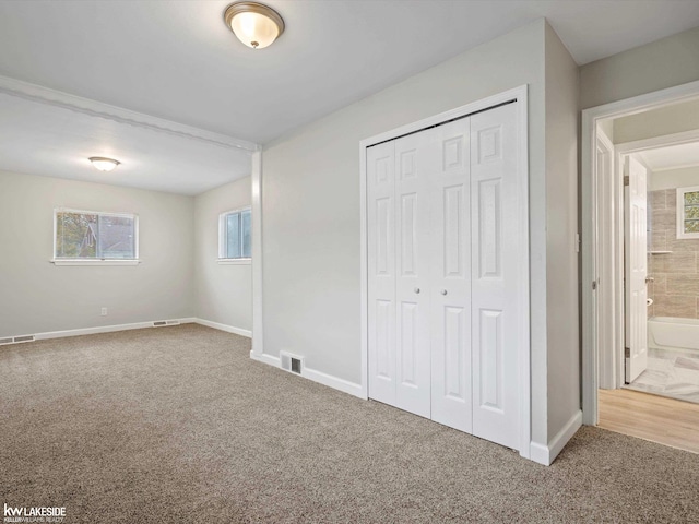 3422 S Annabelle St, Detroit, MI 48217 - unfurnished bedroom with carpet, a closet, and baseboards