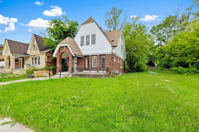 5553 Nottingham Rd, Detroit, MI 48224 - view of front of property with brick siding and roof with shingles