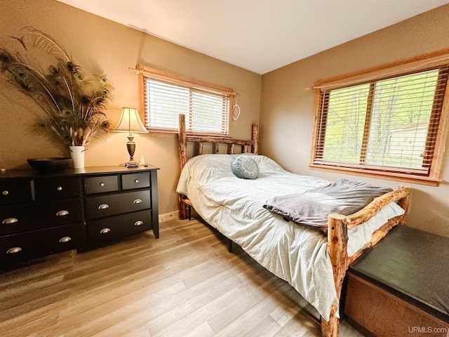 213 W Arch St, Negaunee, MI 49866 - bedroom featuring light wood-type flooring