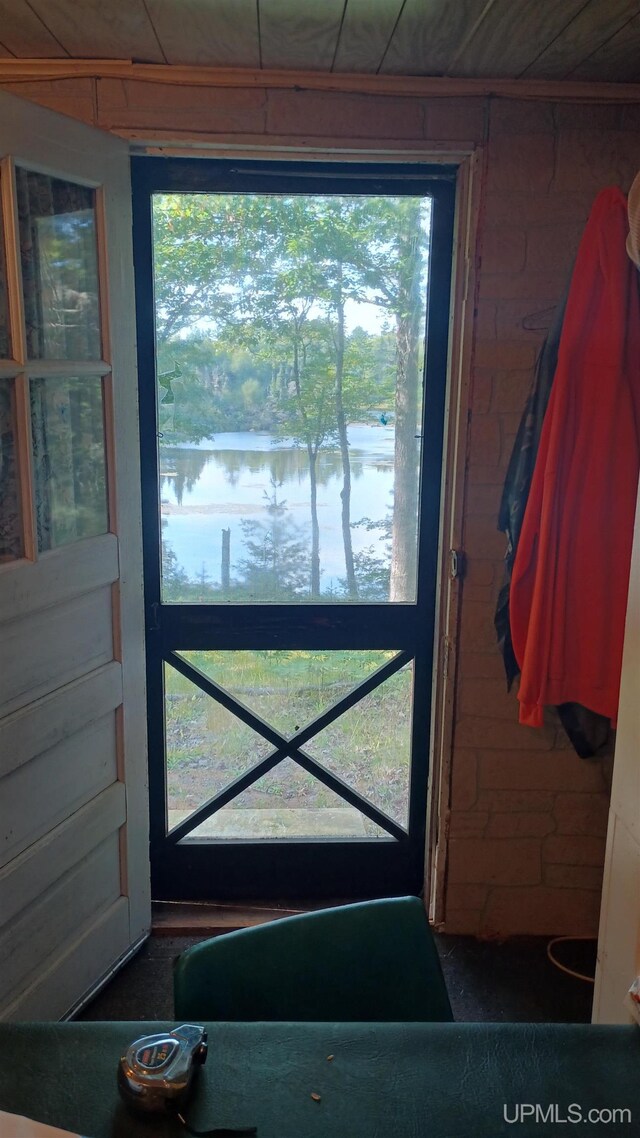 113 Paint Lake Loop, Iron River, MI 49935 - entryway with healthy amount of natural light and a water view
