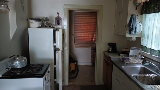 113 Paint Lake Loop, Iron River, MI 49935 - kitchen with a sink and range with gas cooktop