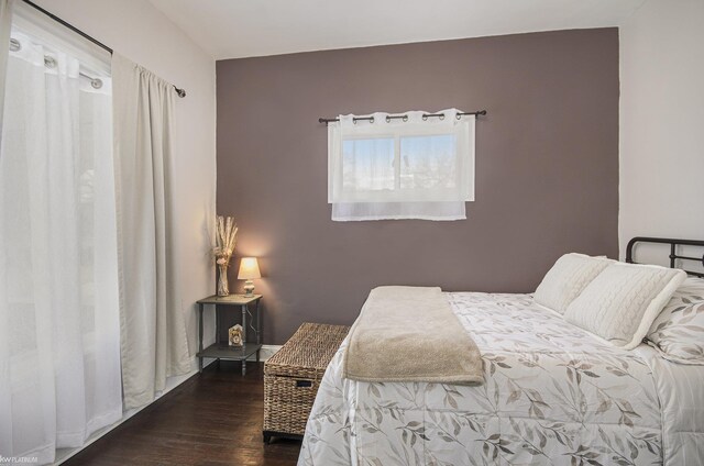17315 Kershaw St, Roseville, MI 48066 - bedroom with dark wood-style floors