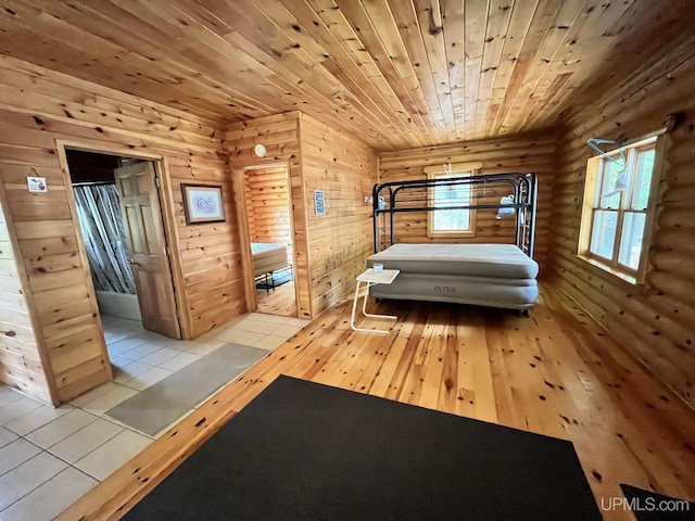 14520 7th Rd, Garden, MI 49835 - bedroom featuring wood ceiling, hardwood / wood-style floors, and log walls
