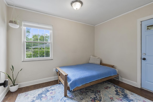 3106 Winifred St, Wayne, MI 48184 - bedroom featuring baseboards, crown molding, and wood finished floors
