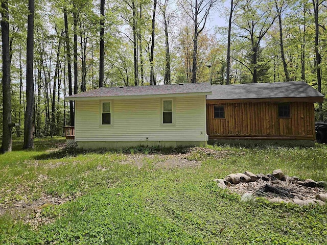 4949 Filter Rd, Harrison, MI 48625 - view of rear view of house