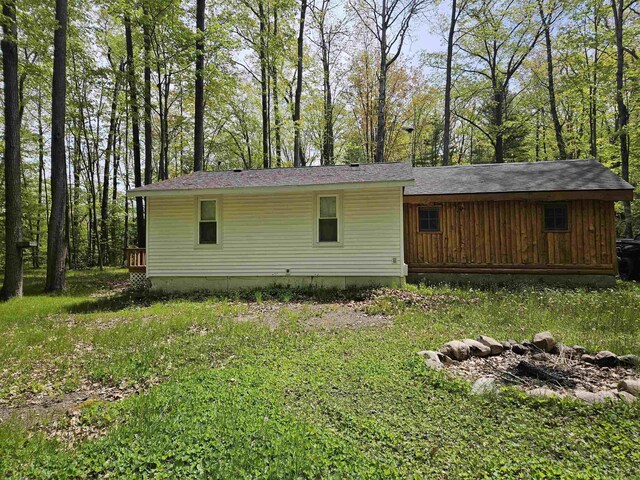 4949 Filter Rd, Harrison, MI 48625 - view of rear view of house