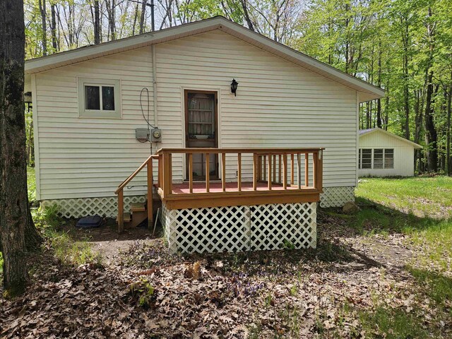 4949 Filter Rd, Harrison, MI 48625 - back of property with a deck