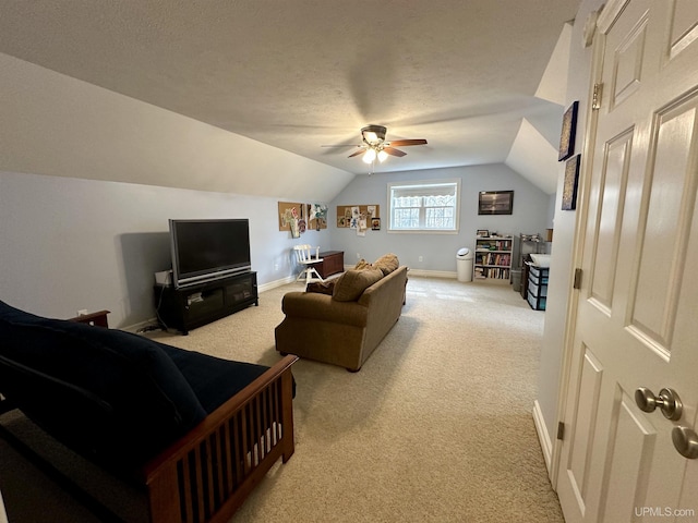 119 Mallard Ln, Gladstone, MI 49837 - living area featuring light colored carpet, vaulted ceiling, a ceiling fan, baseboards, and a textured ceiling