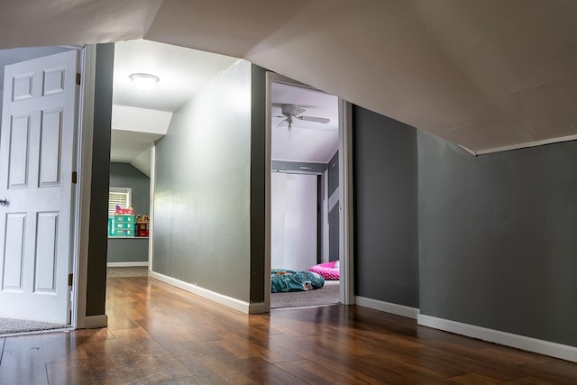 2129 N Clinton St, Saginaw, MI 48602 - additional living space featuring wood finished floors, lofted ceiling, a ceiling fan, and baseboards