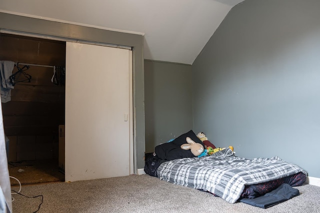 2129 N Clinton St, Saginaw, MI 48602 - bedroom with vaulted ceiling and carpet floors