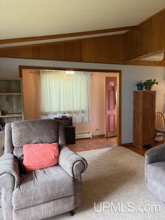 406 3rd Ave, Wakefield, MI 49968 - living room featuring a baseboard radiator and lofted ceiling