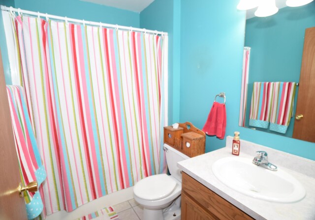 3850 Mando Ct, Coleman, MI 48611 - full bathroom with toilet, vanity, tile patterned floors, and a shower with curtain