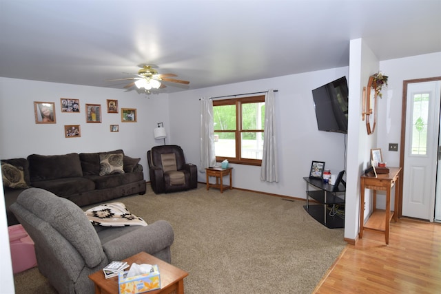 3850 Mando Ct, Coleman, MI 48611 - living area with a ceiling fan and light wood-style floors