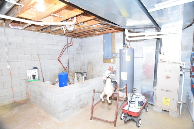 3850 Mando Ct, Coleman, MI 48611 - unfinished basement with electric water heater, a water pressure tank, and electric panel