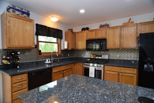 3850 Mando Ct, Coleman, MI 48611 - kitchen featuring black appliances, a sink, tasteful backsplash, and dark stone counters