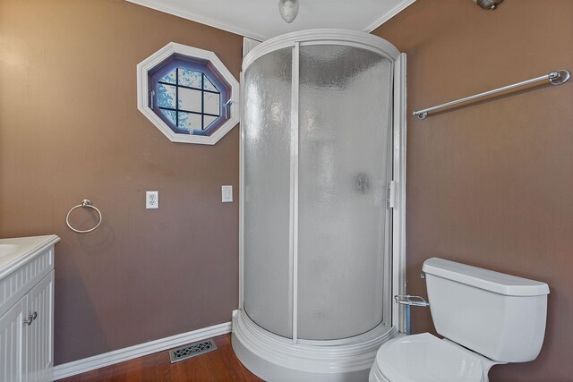 48816 Point Lakeview Dr, Chesterfield Twp, MI 48047 - bathroom featuring a shower stall, vanity, toilet, and baseboards