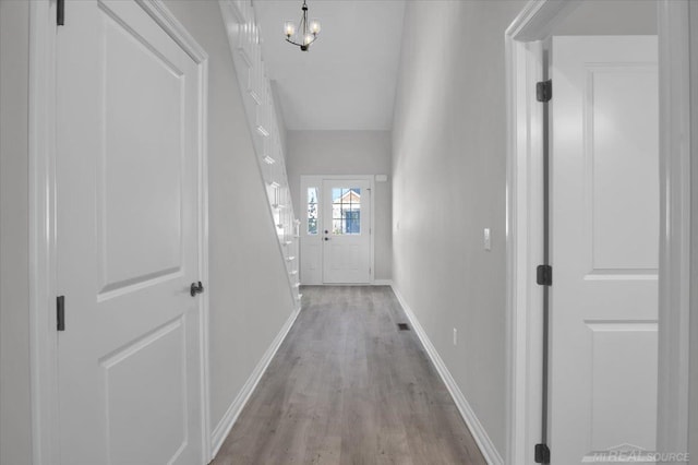27621 Maryjane Ln E, Chesterfield Twp, MI 48047 - corridor featuring light wood finished floors and baseboards