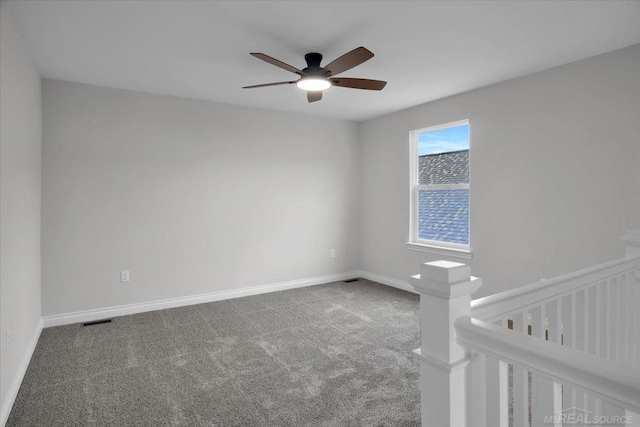 27621 Maryjane Ln E, Chesterfield Twp, MI 48047 - unfurnished room with carpet, a ceiling fan, and baseboards