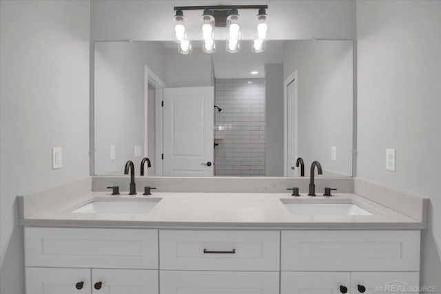 27621 Maryjane Ln E, Chesterfield Twp, MI 48047 - bathroom with double vanity and a tile shower