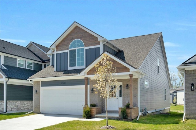 27621 Maryjane Ln E, Chesterfield Twp, MI 48047 - craftsman inspired home with concrete driveway, board and batten siding, a front lawn, roof with shingles, and brick siding
