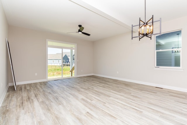 27633 Maryjane Ln E, Chesterfield Twp, MI 48047 - unfurnished room featuring light wood-style flooring, a chandelier, baseboards, and ceiling fan