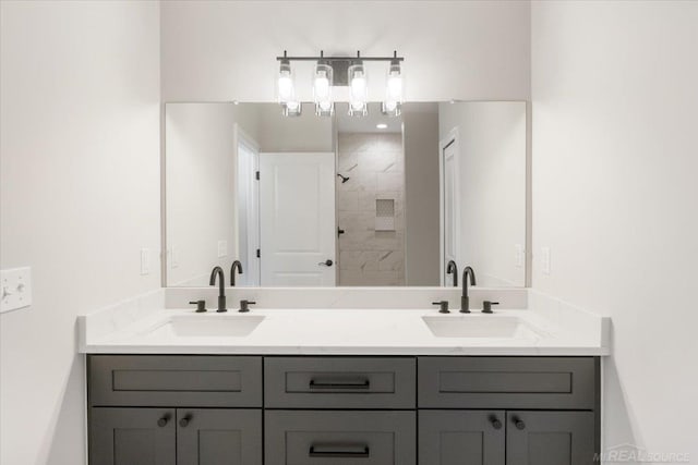 27633 Maryjane Ln E, Chesterfield Twp, MI 48047 - bathroom with double vanity and a tile shower