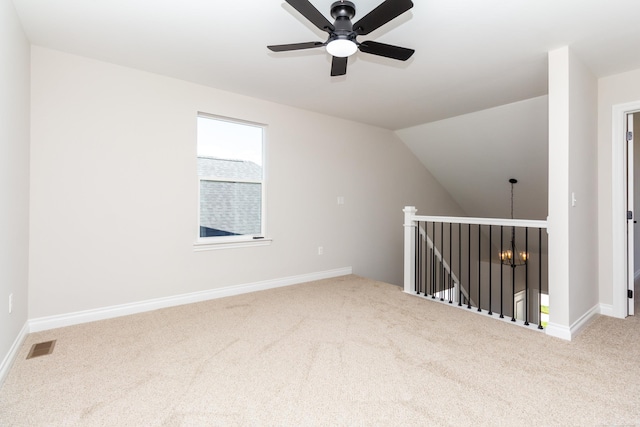 27633 Maryjane Ln E, Chesterfield Twp, MI 48047 - carpeted empty room with a ceiling fan, baseboards, and vaulted ceiling