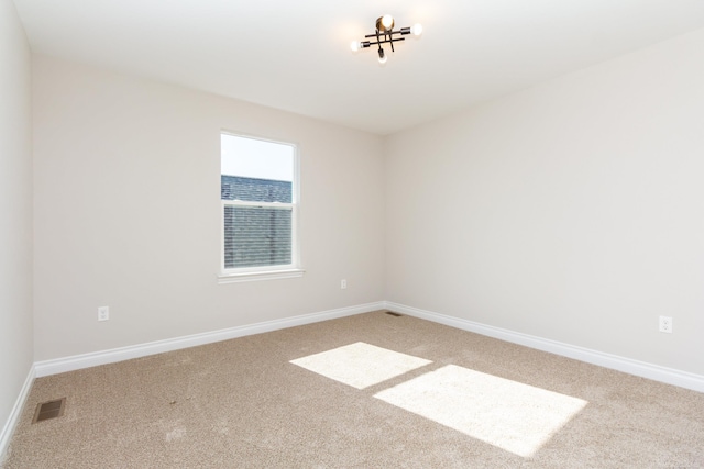 27633 Maryjane Ln E, Chesterfield Twp, MI 48047 - empty room featuring carpet and baseboards