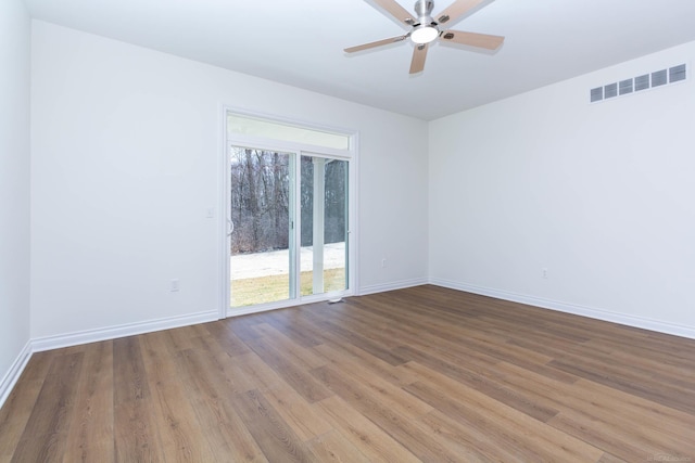 27632 Maryjane Ln E, Chesterfield Twp, MI 48047 - spare room with a ceiling fan, wood finished floors, and baseboards