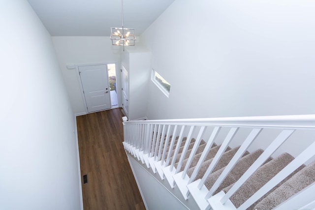 27632 Maryjane Ln E, Chesterfield Twp, MI 48047 - stairs with wood finished floors and a chandelier