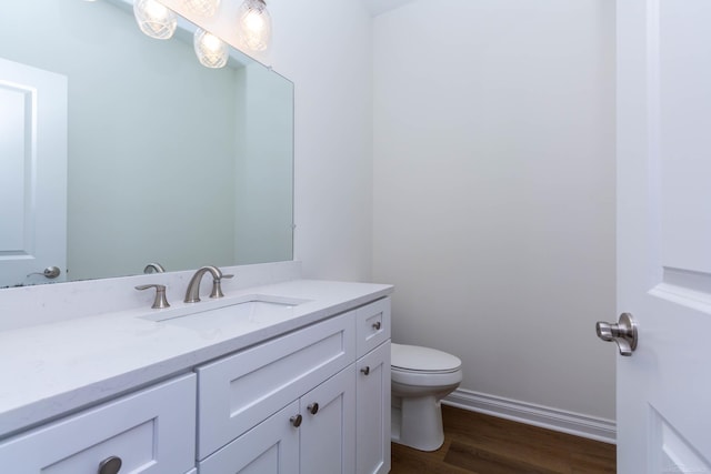 27632 Maryjane Ln E, Chesterfield Twp, MI 48047 - half bath with toilet, vanity, wood finished floors, and baseboards