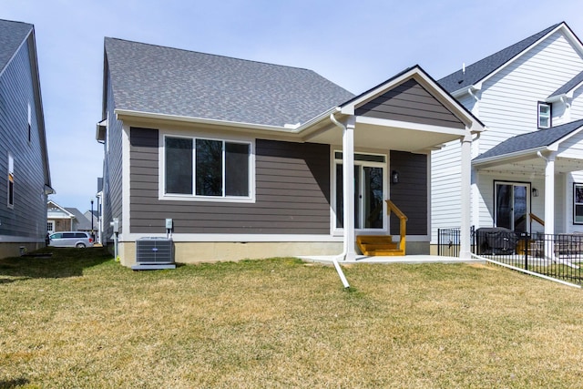 27632 Maryjane Ln E, Chesterfield Twp, MI 48047 - view of front facade with a front yard and cooling unit