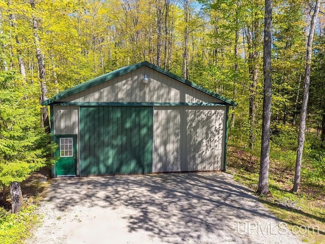E1849 H44 Hwy, Trenary, MI 49891 - detached garage featuring a view of trees