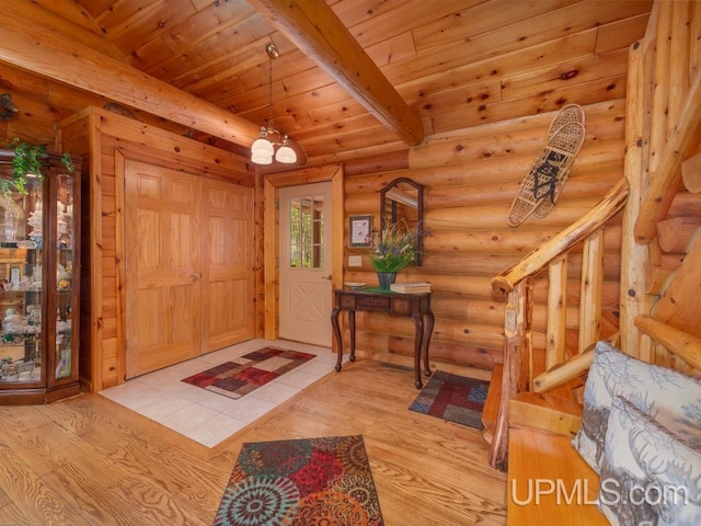 E1849 H44 Hwy, Trenary, MI 49891 - foyer entrance with wood finished floors and wooden ceiling with exposed beams