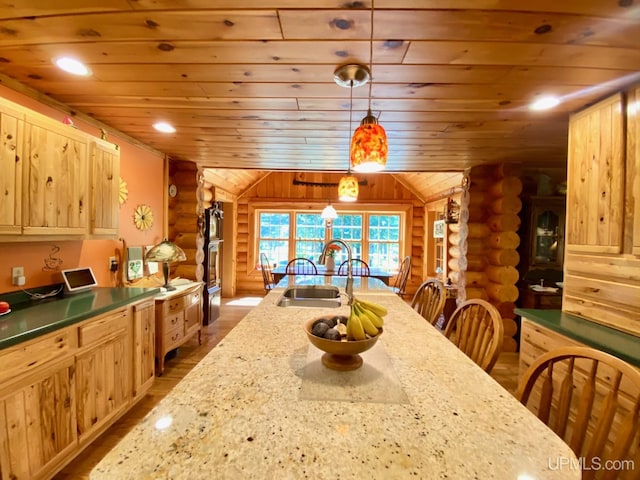 E1849 H44 Hwy, Trenary, MI 49891 - kitchen featuring rustic walls, a sink, wooden ceiling, dark wood finished floors, and lofted ceiling