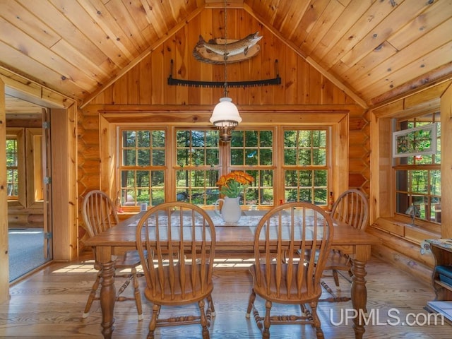 E1849 H44 Hwy, Trenary, MI 49891 - dining room with lofted ceiling, wooden ceiling, wood-type flooring, rustic walls, and wooden walls