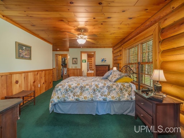 E1849 H44 Hwy, Trenary, MI 49891 - carpeted bedroom with wooden ceiling, a wainscoted wall, and log walls