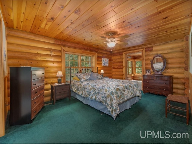 E1849 H44 Hwy, Trenary, MI 49891 - bedroom featuring multiple windows, carpet flooring, wood ceiling, and rustic walls