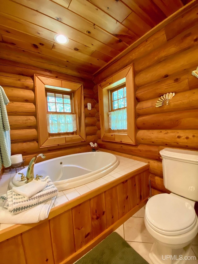 E1849 H44 Hwy, Trenary, MI 49891 - bathroom with plenty of natural light, a garden tub, wooden ceiling, toilet, and log walls