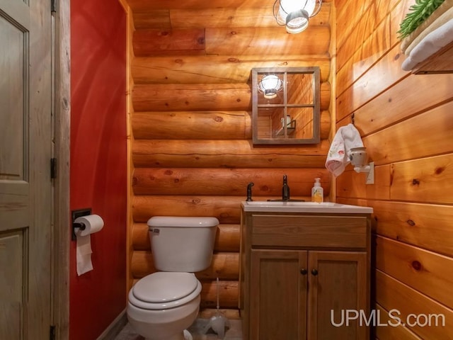 E1849 H44 Hwy, Trenary, MI 49891 - bathroom with vanity, toilet, and log walls