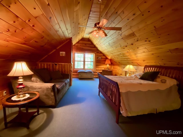 E1849 H44 Hwy, Trenary, MI 49891 - carpeted bedroom featuring lofted ceiling, wood walls, and wood ceiling