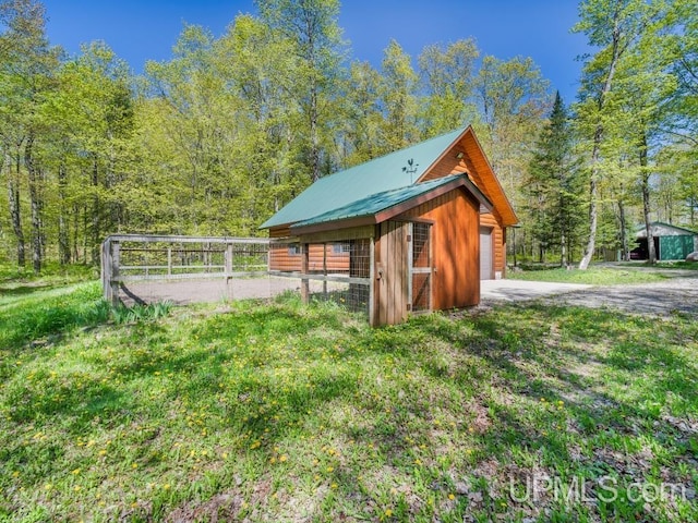 E1849 H44 Hwy, Trenary, MI 49891 - view of outdoor structure featuring a wooded view