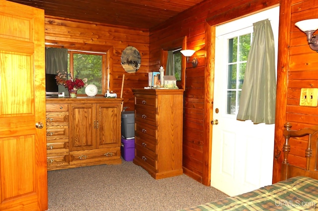 22252 E Webb Rd, Grand Marais, MI 49839 - bedroom featuring carpet, wood walls, and wood ceiling