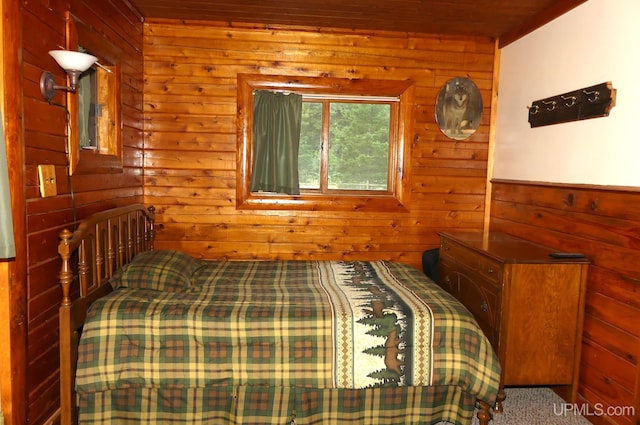 22252 E Webb Rd, Grand Marais, MI 49839 - carpeted bedroom featuring wood walls and wood ceiling
