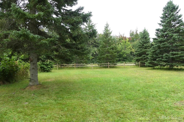 22252 E Webb Rd, Grand Marais, MI 49839 - view of yard featuring a view of trees